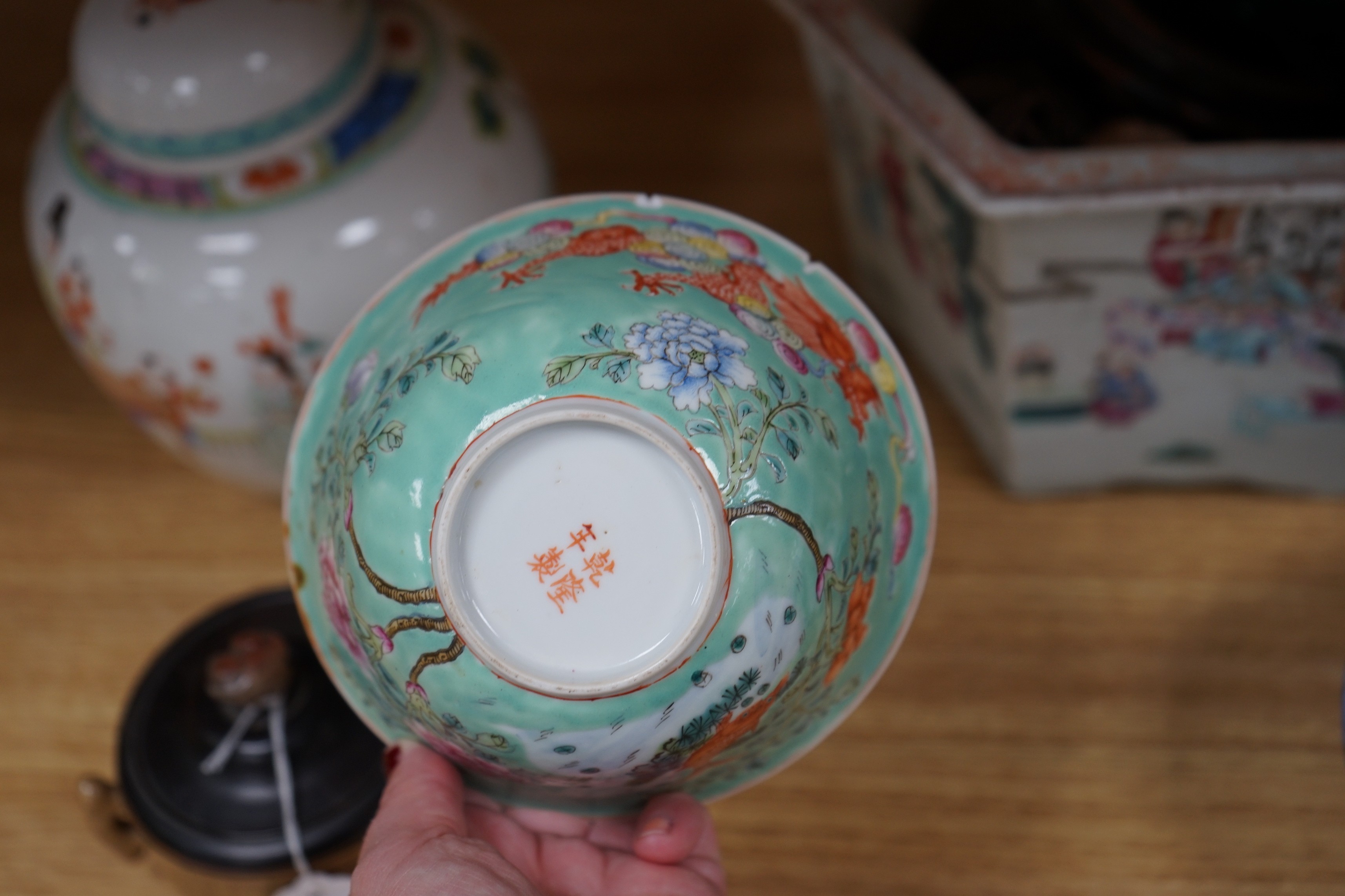 A 19th century Chinese famille rose planter, a jar and cover, two bowls and a crackle ware censer and wood cover, plater 16 cms high